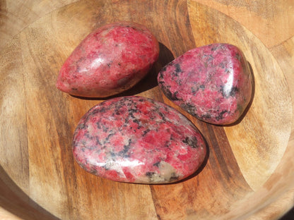 Polished natural Rhodonite stand